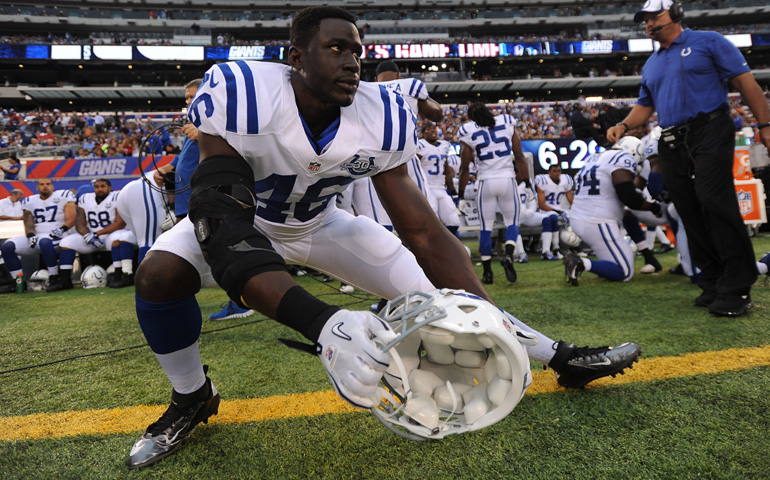 Indianapolis Colts linebacker Daniel Adongo stretches before a preseason game at MetLife Stadium in East Rutherford, N.J., in 2013. (CNS/The Criterion/Courtesy of the Indianapolis Colts)