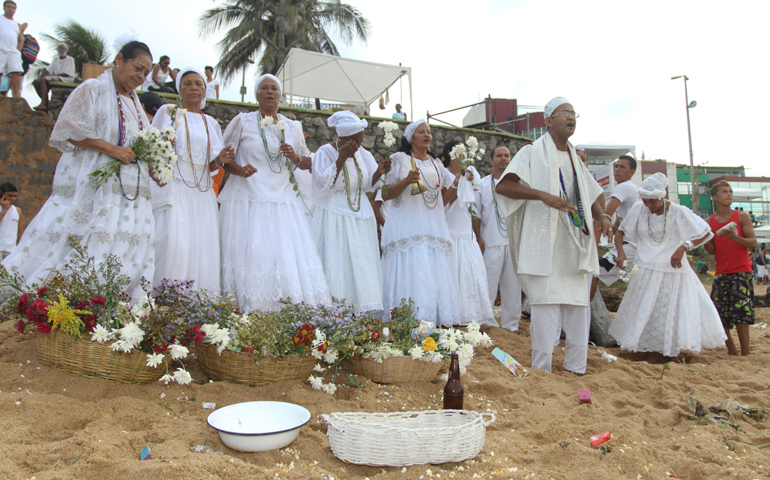 Candomblé devotees take part in rituals and offer gifts to Yemanja, patron of the ocean, in Salvador, Brazil, in 2012. (Newscom/Agencia Estad/Picture Alliance/Ricardo Cardoso)