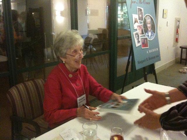 Sr. Margaret Brennan, signing her memoir, in 2009 (Courtesy of Sisters, Servants of the Immaculate Heart of Mary, Monroe, Mich.)