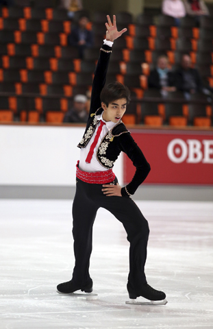 Philippine figure skater Michael Christian Martinez performs in the 2013 Nebelhorn Trophy competition in Oberstdorf, Germany. Martinez, ranked fifth in the World Junior Figure Skating Championships, will be the first skater to represent the Philippines in the Winter Games in Sochi, Russia, in February. (CNS/Robin Ritoss) 