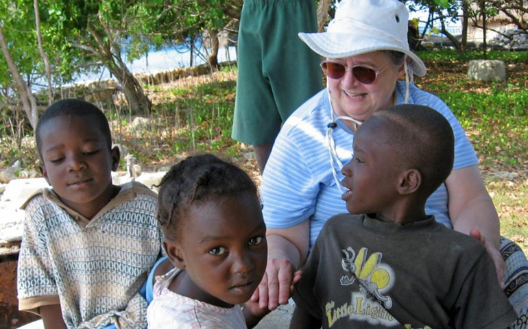 Sr. Josephine Dybza with three young villagers in Jeremie, Haiti. (All photos courtesy of Sylvania Franciscans)