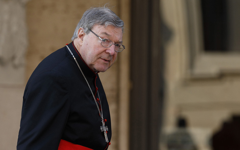 Australian Cardinal George Pell arrives for the Oct. 6, 2014, opening session of the extraordinary Synod of Bishops on the family at the Vatican. (CNS/Paul Haring)