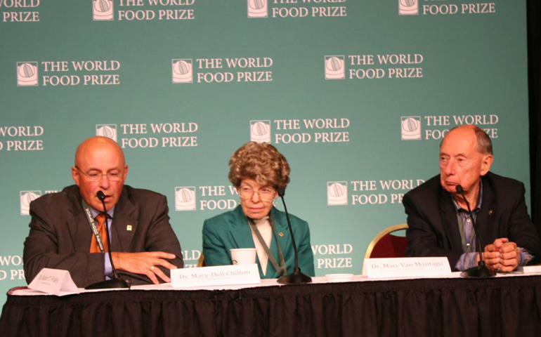 From left: Robert Fraley, Mary-Dell Chilton and Marc Van Montagu answer questions at a press conference Oct. 16 in Des Moines, Iowa. (NCR photo/Megan Fincher)