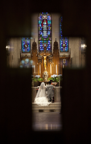 A couple is married in a Catholic church in Los Angeles in 2013 (Newscom/Aurelio Jose Barrera) 