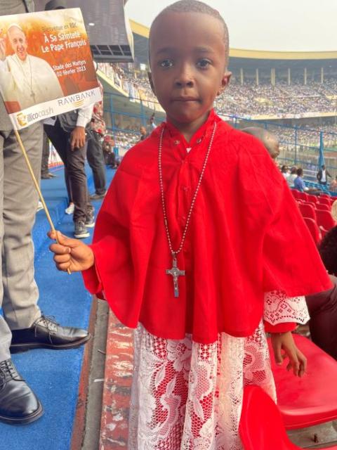 6-year-old boy dressed as a cardinal