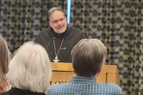 Bishop John Stowe of Lexington, Kentucky gives a talk on "The Common Good and Synodality: The Vision of Pope Francis" April 11. (NCR photo/Heidi Schlumpf)