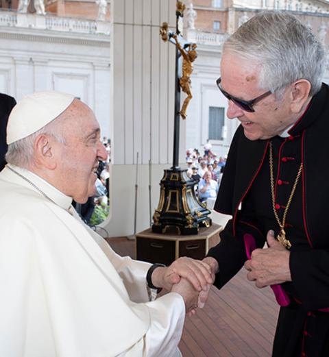 Las Vegas Archbishop George Thomas greets Pope Francis at the end of the pope's weekly general audience June 28 in St. Peter's Square at the Vatican. (CNS/Vatican Media)