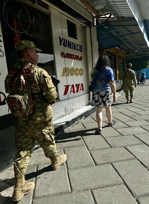 Soldiers march Jan. 30 near the cathedral of San Salvador, days before presidential and legislative elections in El Salvador. (NCR photo/Rhina Guidos)