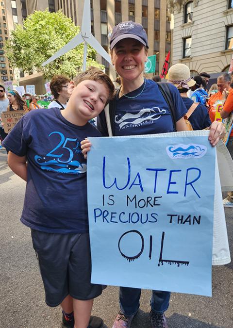 Blair Nelsen at a Sept 17, 2023, climate march joined by her son, Noah Prata Nelsen (GSR photo/Chris Herlinger)