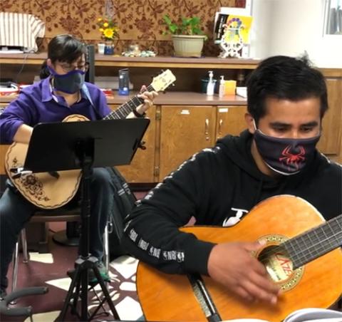 Students take music classes as part of the afterschool program at Give Me a Chance in Ogden, Utah. (Courtesy of Give Me a Chance/Marissa Konkol)