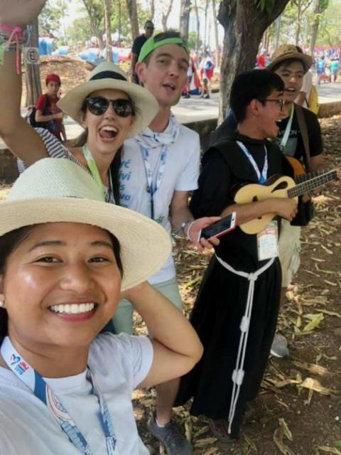 Luke Henkel, center, of Seattle poses with other young Catholics during World Youth Day in Panama in January. (Laudato Si' Generation)