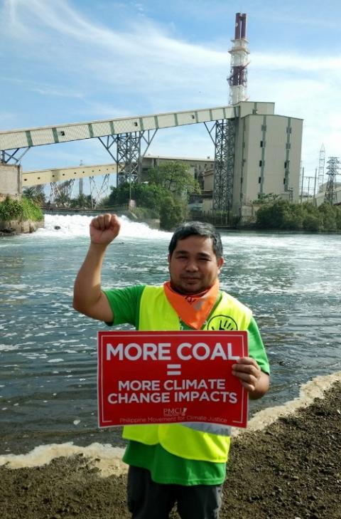 Br. Jaazeal Jakosalem, aka Brother Tagoy, joins a direct action against a coal plant in Toledo City, Cebu, Philippines. (Provided photo)