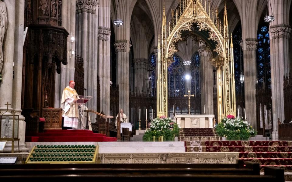 New York Cardinal Timothy Dolan celebrates Easter Mass at St. Patrick's Cathedral April 12 during the coronavirus pandemic. (CNS/Reuters/Jeenah Moon)