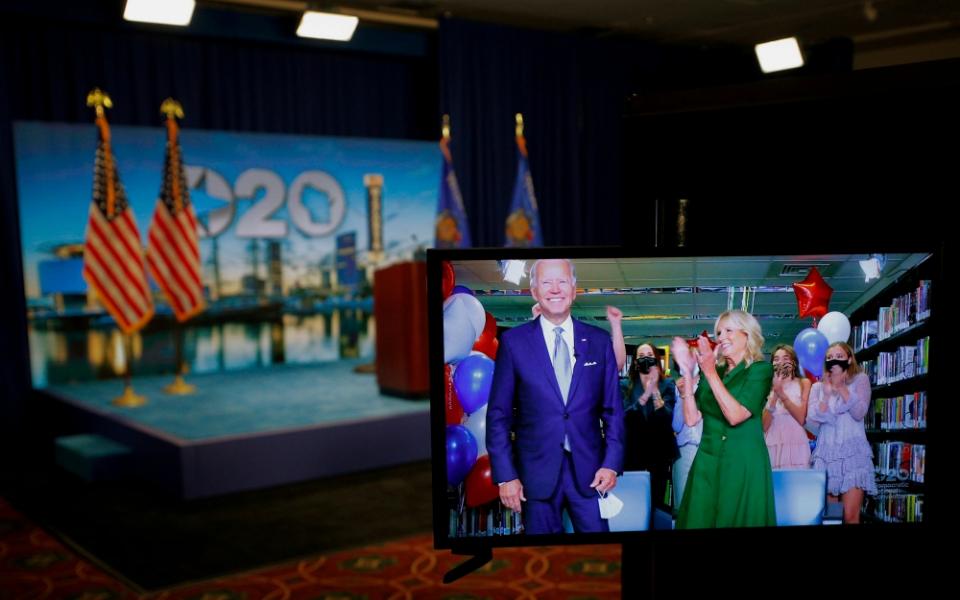 The Democratic presidential nominee, former Vice President Joe Biden, and his wife, Jill Biden, are seen in a video feed from Delaware after winning the votes to become the party's 2020 nominee for president Aug. 18. (CNS/Brian Snyder, Pool via Reuters)
