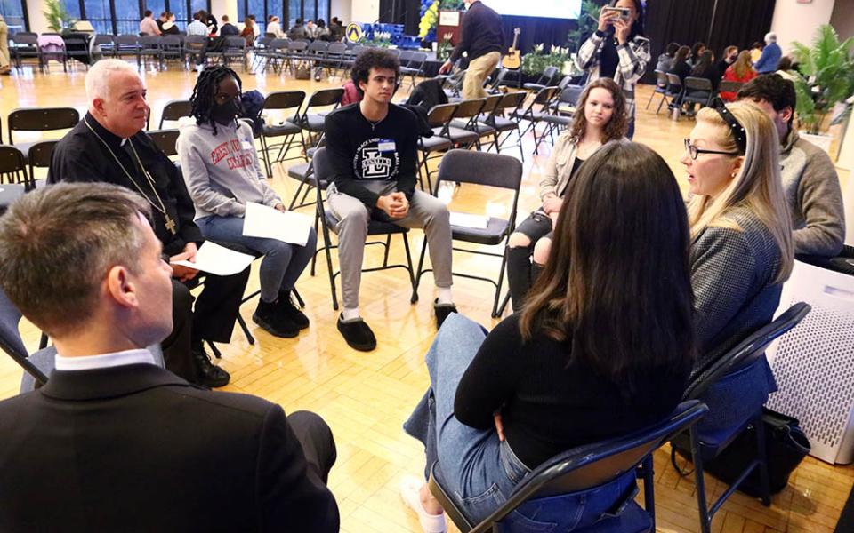 Philadelphia Archbishop Nelson Pérez joins college students, other young adults and ministry leaders during a synodal listening session at La Salle University April 4, 2022. (CNS/CatholicPhilly.com/Sarah Webb)