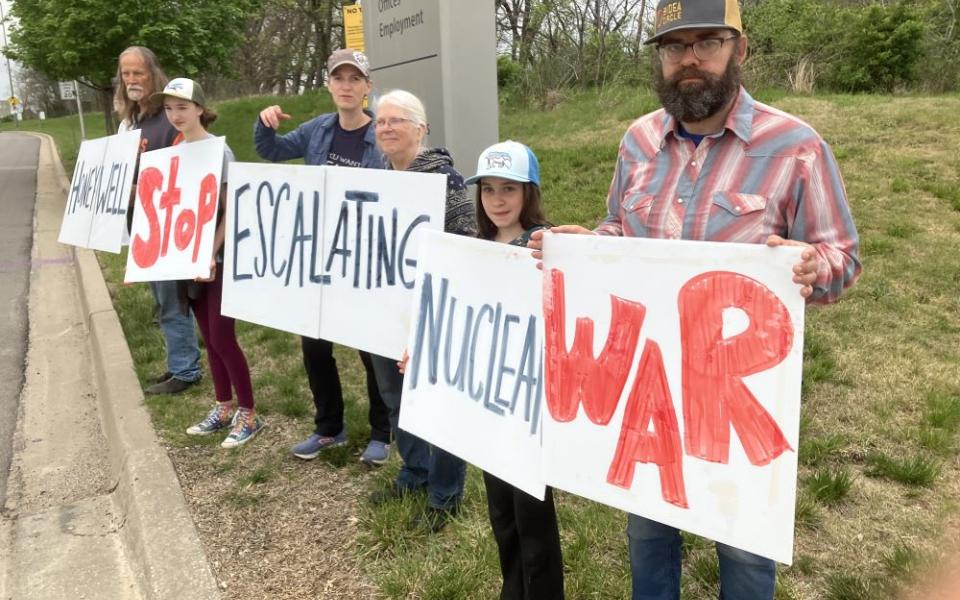 About 50 people protested April 15 outside the Kansas City National Security Campus, a plant run by Honeywell, calling for an end to nuclear weapons and criticizing a proposed expansion of the facility.