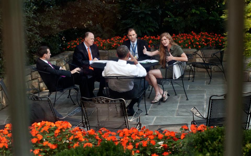 President Barack Obama meets with advisers, including Samantha Power (right), on the patio outside the Oval Office, Sept. 14, 2011. (Flickr/Obama White House/Pete Souza)