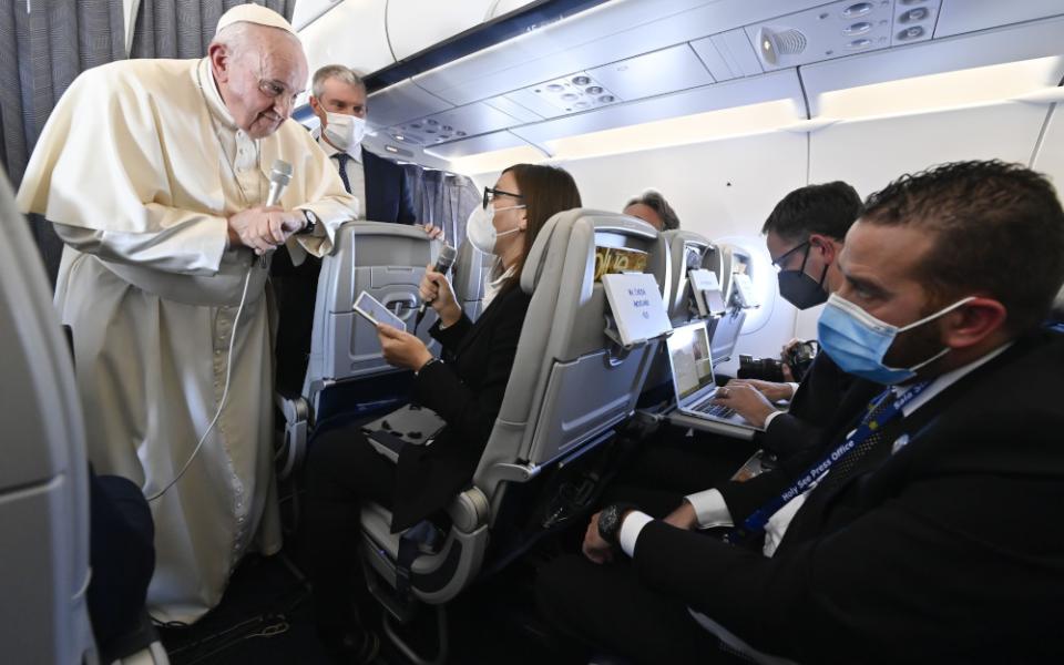 Pope Francis answers questions from journalists aboard his flight from Athens, Greece, to Rome Dec. 6, 2021. (CNS/Vatican Media)