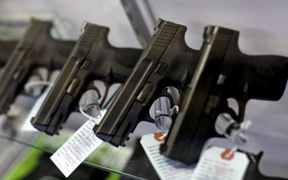 Handguns are seen for sale in a display case at Metro Shooting Supplies in Bridgeton, Missouri. (CNS/Reuters/Jim Young)