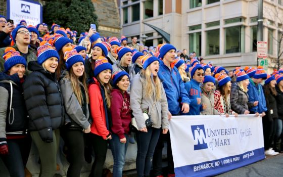 Students from the University of Mary in Bismarck, North Dakota, chant pro-life cheers Jan. 27, 2017, outside of St. Patrick's Catholic Church in Washington, D.C., as they prepare to participate in that year's March for Life. (CNS/Chaz Muth)