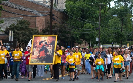 World Youth Day Unite participants march near Washington's Basilica of the National Shrine of the Immaculate Conception July 22, 2017. (CNS/Archdiocese of Washington/Courtesy of Daphne Stubbolo)