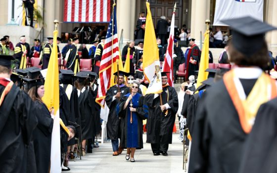 Students and faculty at the Catholic University of America celebrate graduation May 12 in Washington. (CNS/The Catholic University of America/Dana Rene Bowler)