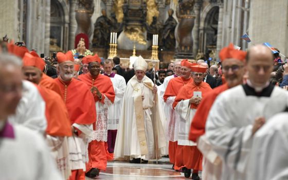 Pope Francis walks in procession with new cardinals during the consistory in St. Peter's Basilica at the Vatican Oct. 5. (CNS/Vatican Media) 