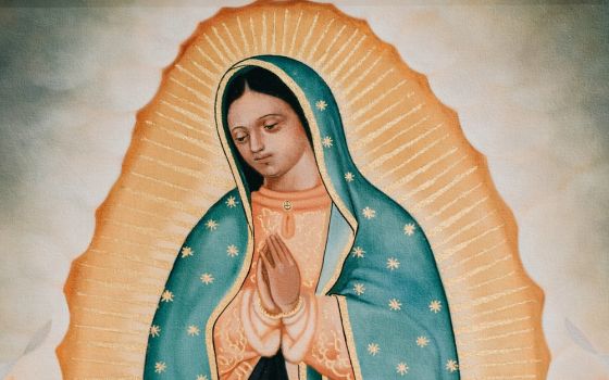 A painting by artist Lalo Garcia is seen in November 2019 an exhibit honoring Our Lady of Guadalupe and St. Juan Diego at the Cathedral of Our Lady of the Angels in Los Angeles. (CNS/Courtesy of the Los Angeles Archdiocese)