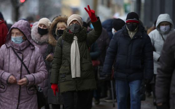 People take part in an opposition rally to demand the resignation of Belarusian President Alexander Lukashenko and to protest against police violence Nov. 30 in Minsk, Belarus. The Catholic bishops in Belarus said the country's "unprecedented socio-politi