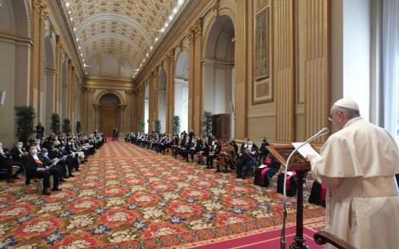 Pope Francis addresses diplomats accredited to the Holy See during an audience in the Hall of Blessings at the Vatican Feb. 8, 2021. (CNS/Vatican Media)
