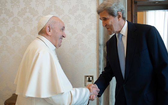 Pope Francis meets John Kerry, U.S. special presidential envoy for climate, May 15 at the Vatican. (CNS/Vatican Media)