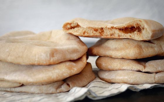 A leavened flatbread akin to pita has been made in the Middle East since before the time of Christ. (CNS/Nancy Wiechec)