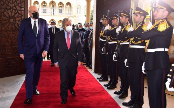 United Nations Secretary-General Antonio Guterres reviews an honor guard as he meets with Lebanon's Prime Minister Najib Mikati in Beirut Dec. 20, 2021. (CNS photo/Dalati Nohra handout via Reuters) 