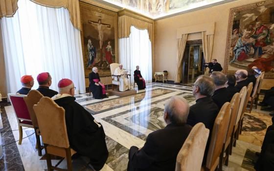 Pope Francis speaks to members of the International Theological Commission during a meeting Nov. 24 in the Apostolic Palace of the Vatican. (CNS/Vatican Media)