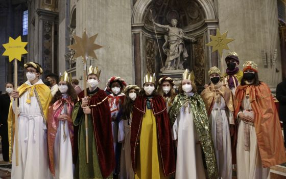 Young people dressed as the Magi are pictured after attending Pope Francis' celebration of Mass on the feast of Mary, Mother of God, at the Vatican Jan. 1, 2022. (CNS photo/Romano Siciliani, pool)