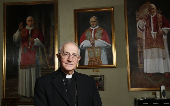 Cardinal Fernando Filoni, grand master of the Equestrian Order of the Holy Sepulchre, is pictured in his office at the order's headquarters in Rome in this April 30, 202. (CNS photo/Paul Haring)