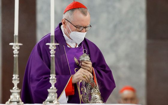 Cardinal Pietro Parolin, Vatican secretary of state, burns incense as he celebrates Ash Wednesday Mass at the Basilica of Santa Sabina March 2 in Rome. Parolin presided in place of Pope Francis, who was not able to attend because of knee pain. (CNS)