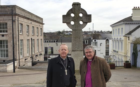 Archbishop Eamon Martin of Armagh, Northern Ireland, and Anglican Archbishop John McDowell of Armagh are pictured in Market Place Square in Armagh March 16, 2022. (CNS photo/Sarah Mac Donald)