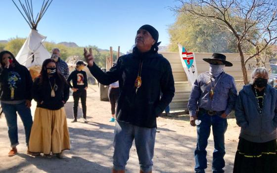 Wendsler Nosie Sr., leader of Apache Stronghold, addresses supporters of Oak Flat, including people from other Native American groups and runners who participated in a protest run in support for Oak Flat, Saturday, Feb. 27, 2021, in Oak Flat, Arizona. (RNS/Alejandra Molina)