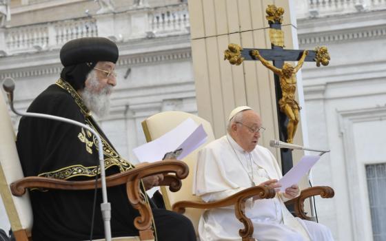 Pope Francis and Coptic Orthodox Pope Tawadros II read speeches in St. Peter's Square at the Vatican May 10, 2023. Pope Tawadros was at the Vatican to commemorate the 50th anniversary of a joint declaration signed by the heads of the Catholic and Coptic Orthodox Churches. (CNS photo/Vatican Media)