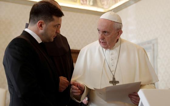 Ukrainian President Volodymyr Zelenskyy is pictured with Pope Francis during a private audience at the Vatican in this Feb. 8, 2020, file photo. 