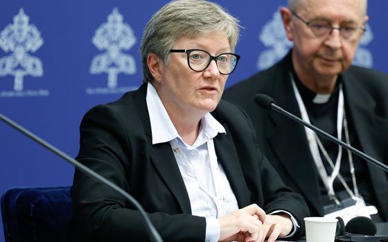 Catherine Clifford, professor of theology at St. Paul University in Ottawa, speaks during a briefing about the assembly of the Synod of Bishops at the Vatican Oct. 26. (CNS/Lola Gomez)