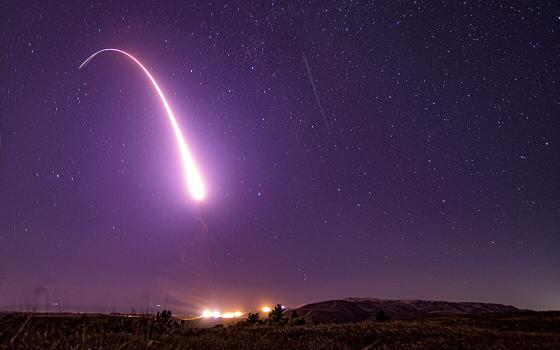 This image taken with a slow shutter speed on Oct. 2, 2019, and provided by the U.S. Air Force shows an unarmed Minuteman 3 intercontinental ballistic missile test launch at Vandenberg Air Force Base, California. (U.S. Air Force via AP/Staff Sgt. J.T. Armstrong)