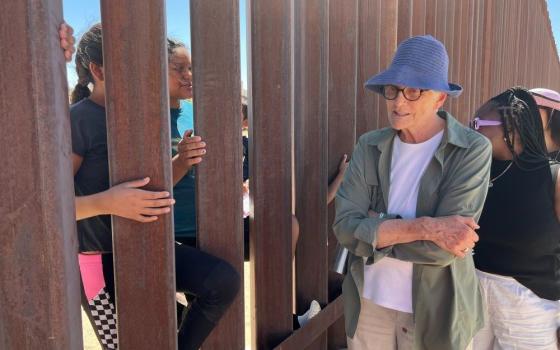 Mercy Sr. Kathleen Erickson is seen at the wall on the U.S. southern border in 2022. 