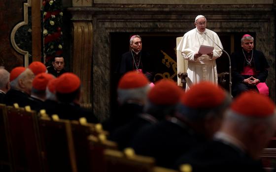 Pope Francis speaks during the traditional greetings to the Roman Curia in the Sala Clementina (Clementine Hall) of the Apostolic Palace, at the Vatican, on Dec. 22, 2016. (AP/Gregorio Borgia, Pool)