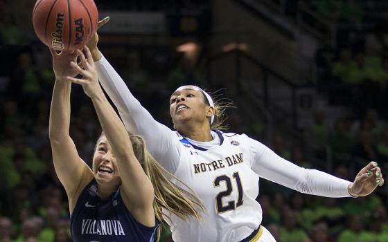 Villanova's Adrianna Hahn (31) competes for a rebound with Notre Dame's Kristina Nelson (21) during a second-round game in the NCAA women's college basketball tournament Sunday, March 18, 2018, in South Bend, Indiana. (AP photo/Robert Franklin)