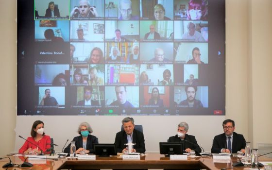 Cardinal Mario Grech, center, secretary-general of the Synod of Bishops, and other Vatican officials lead an online listening session with 30 people who have disabilities May 19. The meeting was part of the process in preparation for the Synod of Bishops.