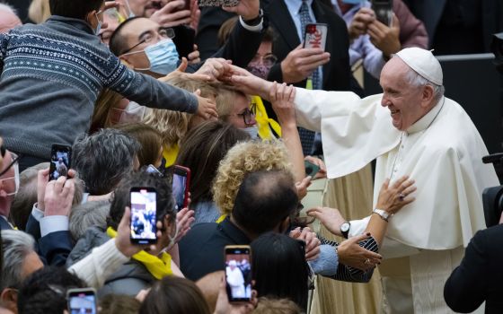  Pope Francis attends an audience in the Paul VI Hall at the Vatican, on Nov. 6, 2021. (AP Photo/Domenico Stinellis)