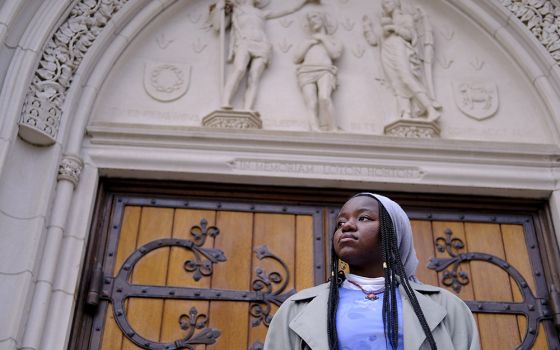 Nathalie Charles poses for a portrait outside the Princeton University Chapel Dec. 8 in Princeton, New Jersey. (AP photo/Luis Andres Henao)