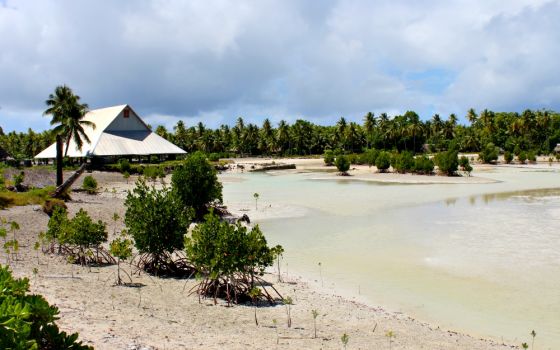 A view of Abaiang, a coral atoll in the nation of Kiribati that is threatened by climate change (Wikimedia Commons/Department of Foreign Affairs and Trade/AusAID)